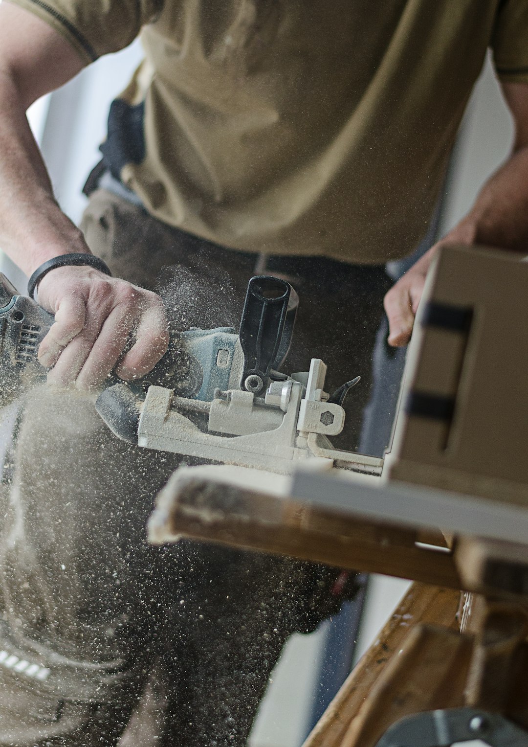 Close-up of table saw blade cutting a tenon